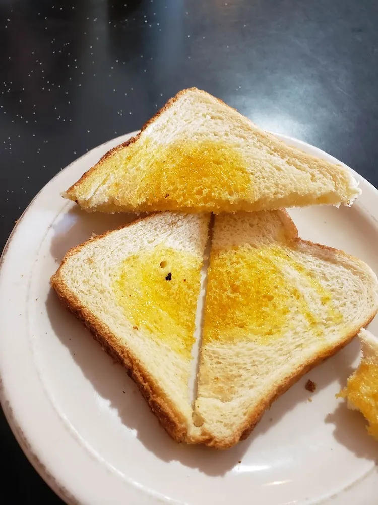 Side of Toast with Some Kind of Drizzled Butter